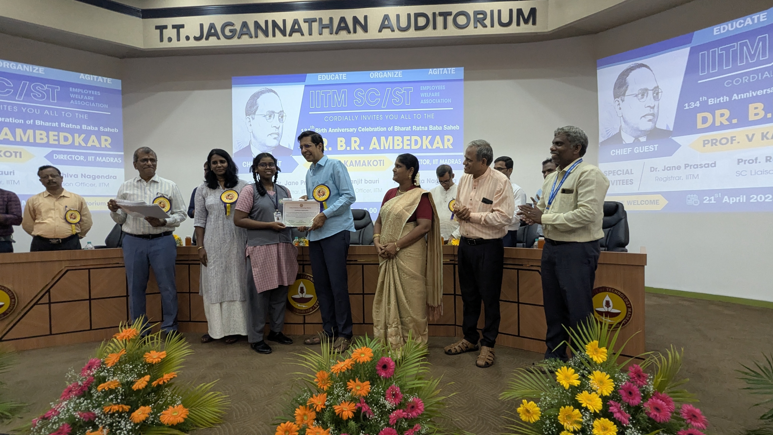 student receiving certificates